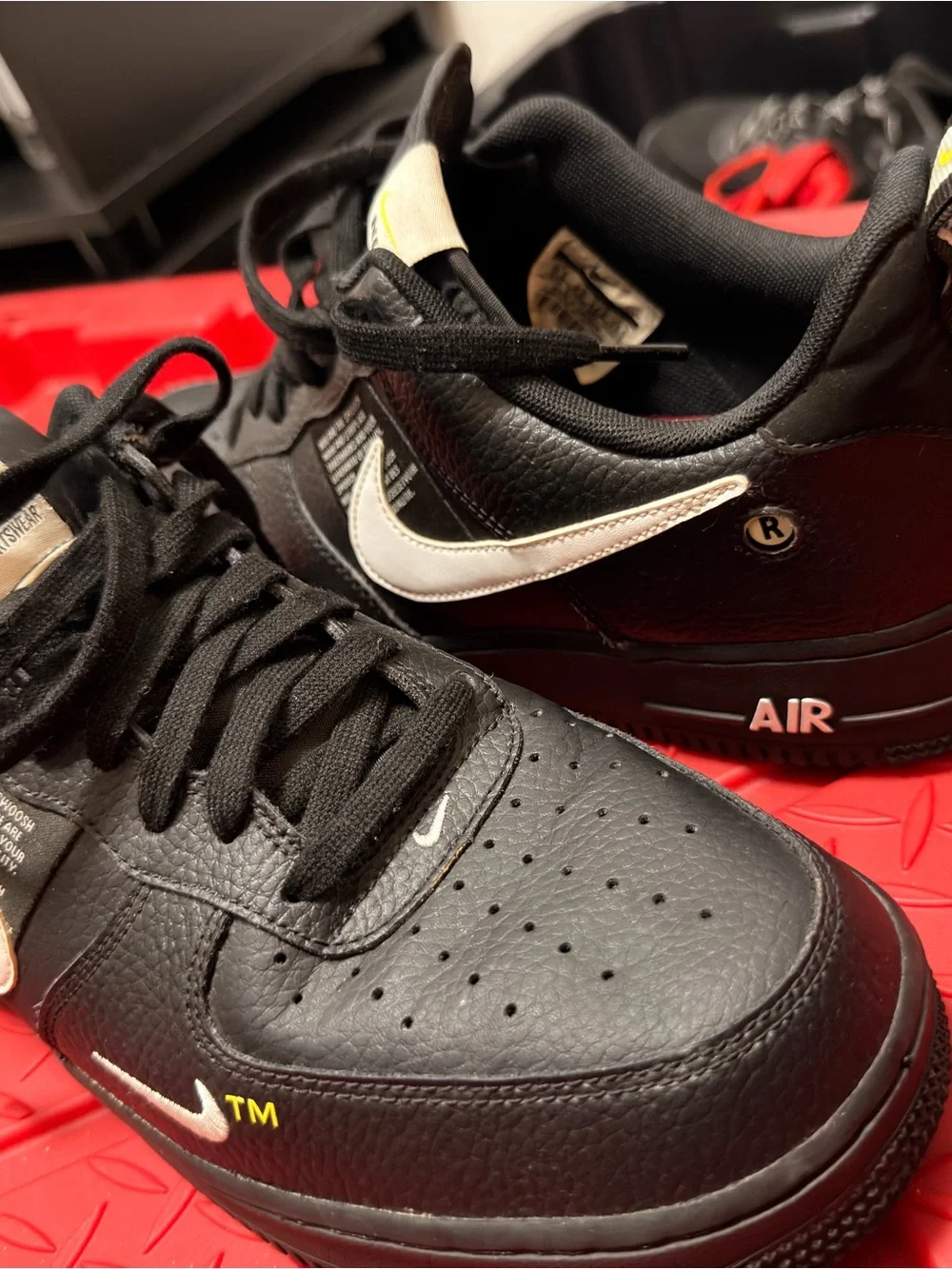 Nike Men’s Black Leather Sneakers with Pink Swoosh